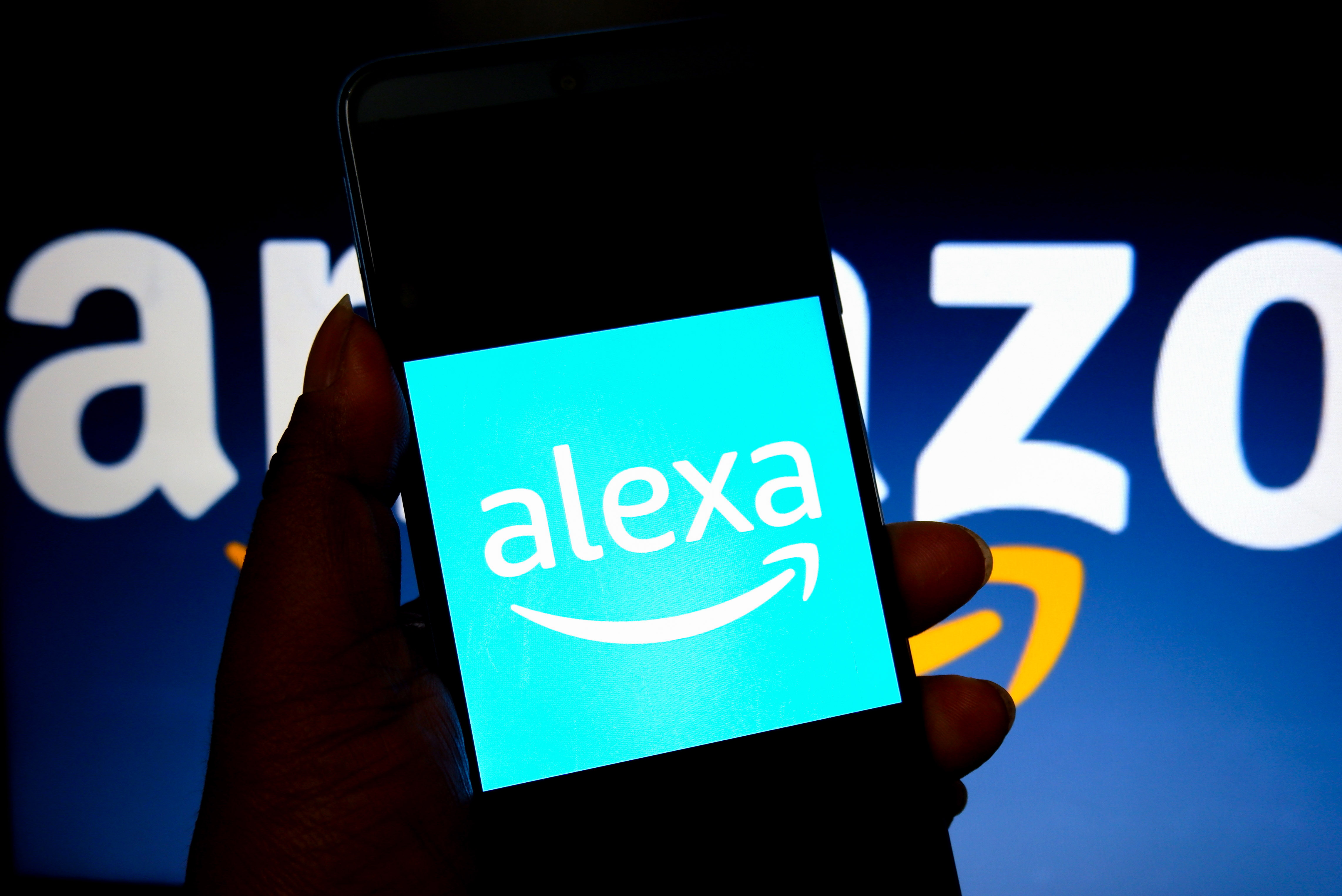 Amazon&#039;s Alexa logo on a phone screen