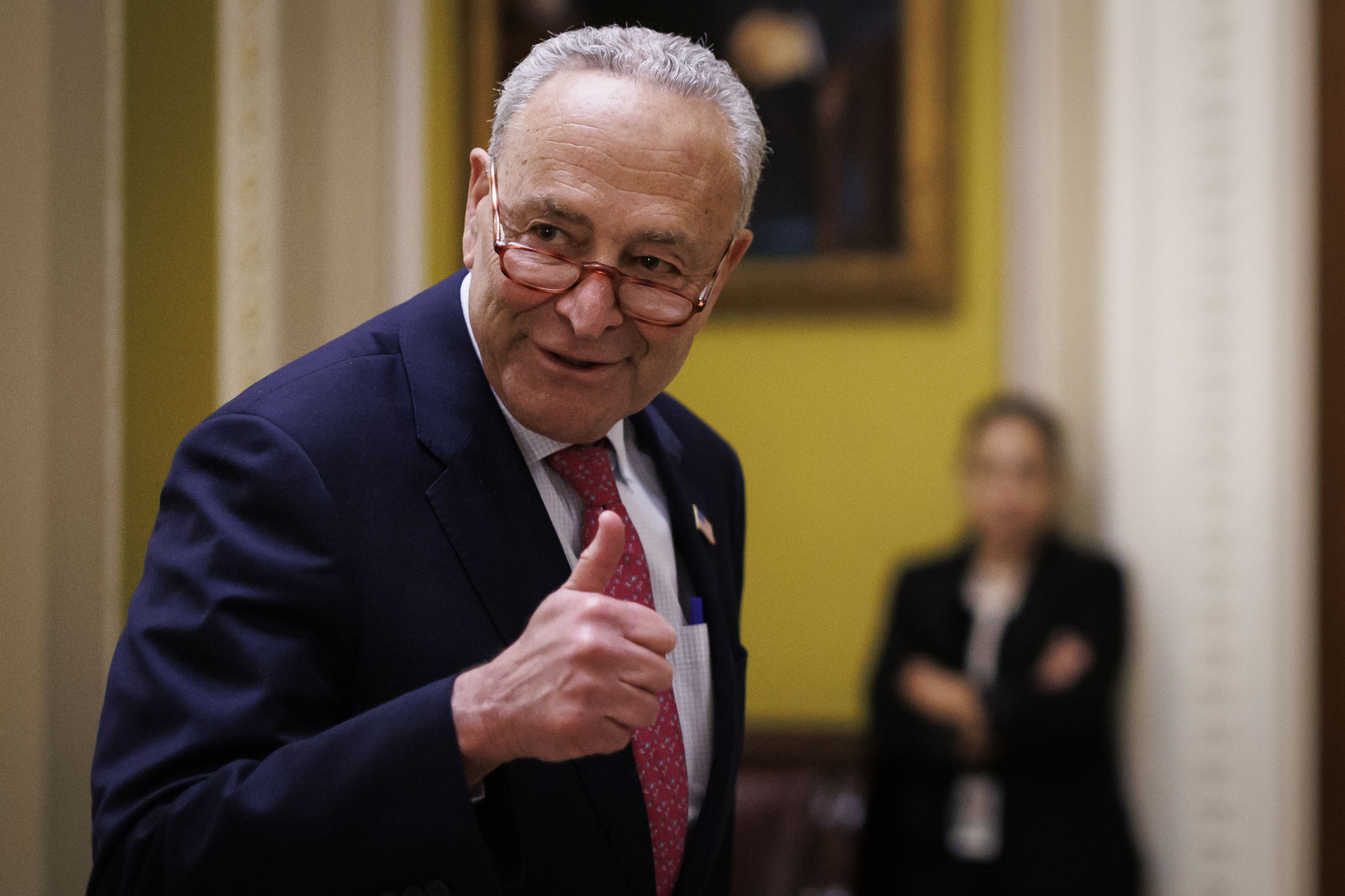 Chuck Schumer gives a thumbs up 