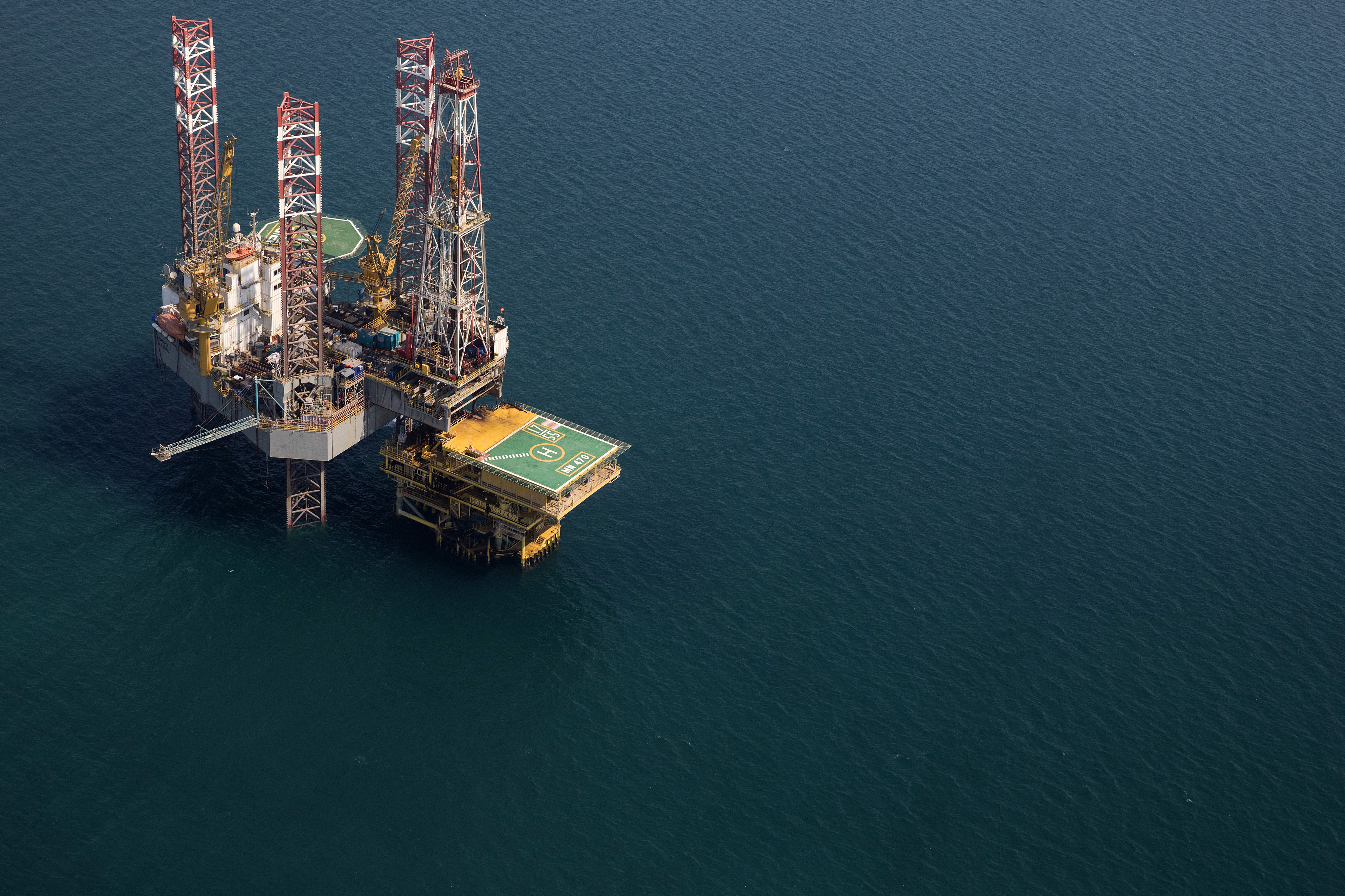 An oil drilling platform in the sea