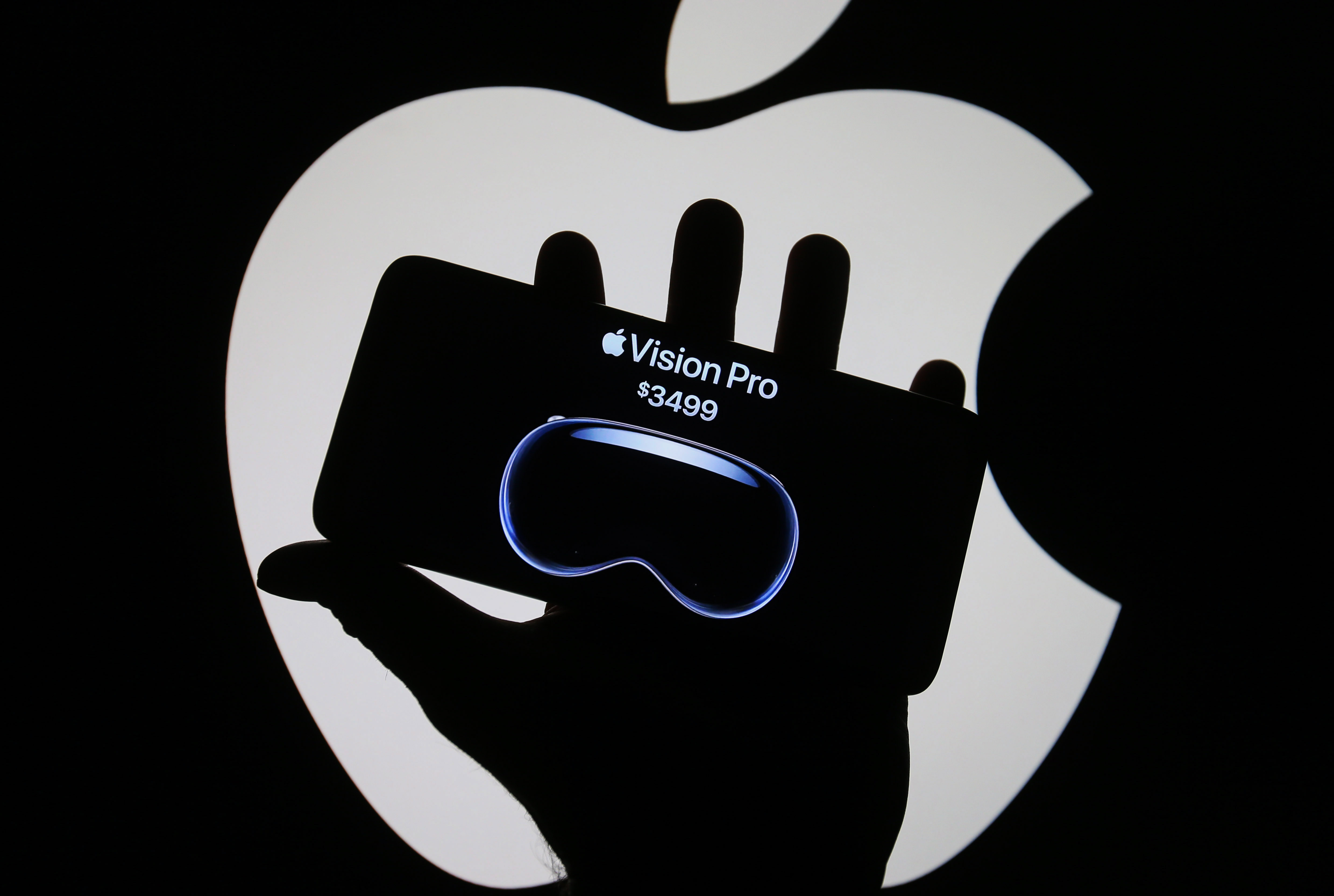 Apple&#039;s Vision Pro mixed-reality headset pictured on an iPhone screen