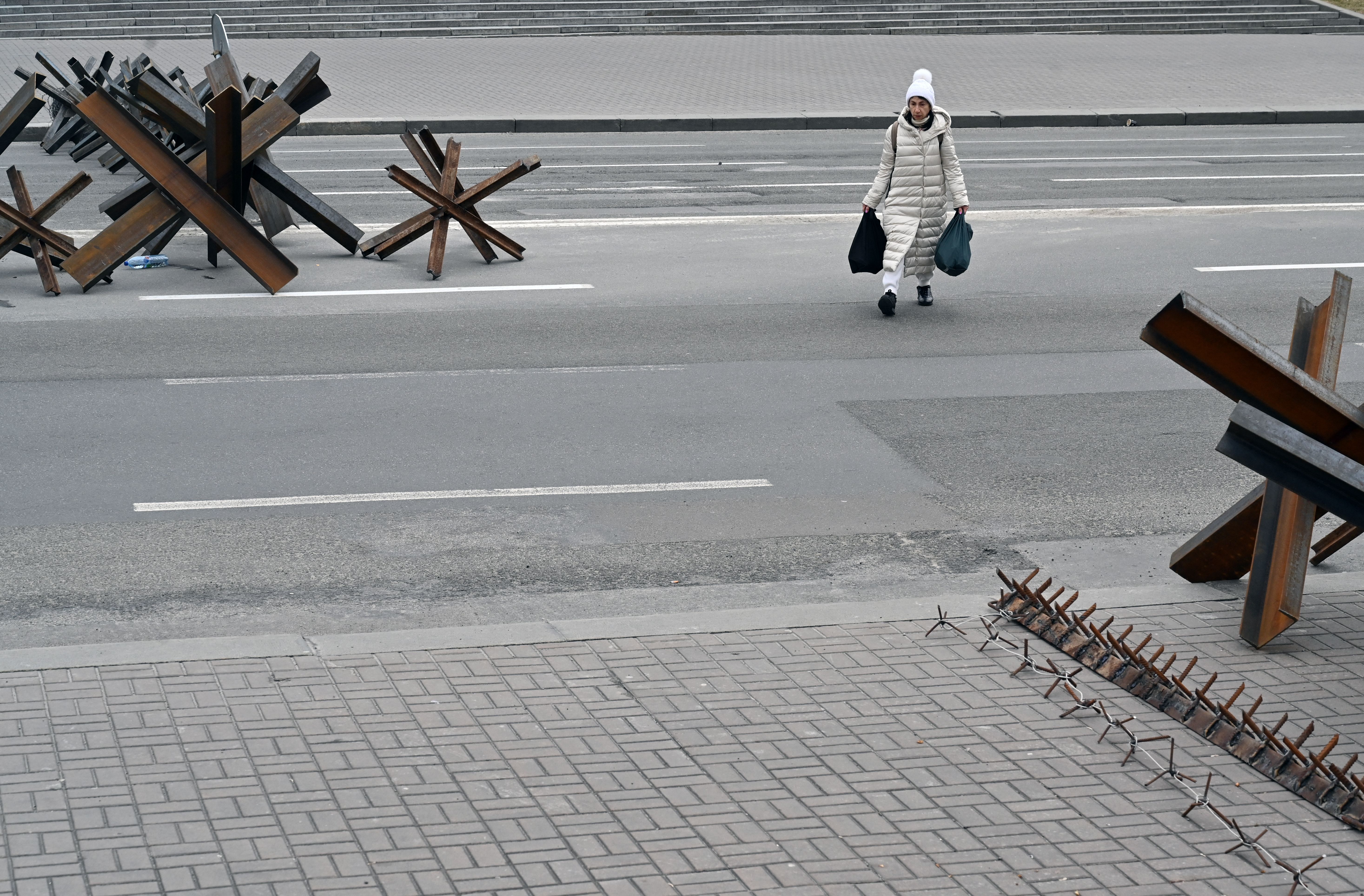 A woman walking in Kyiv.
