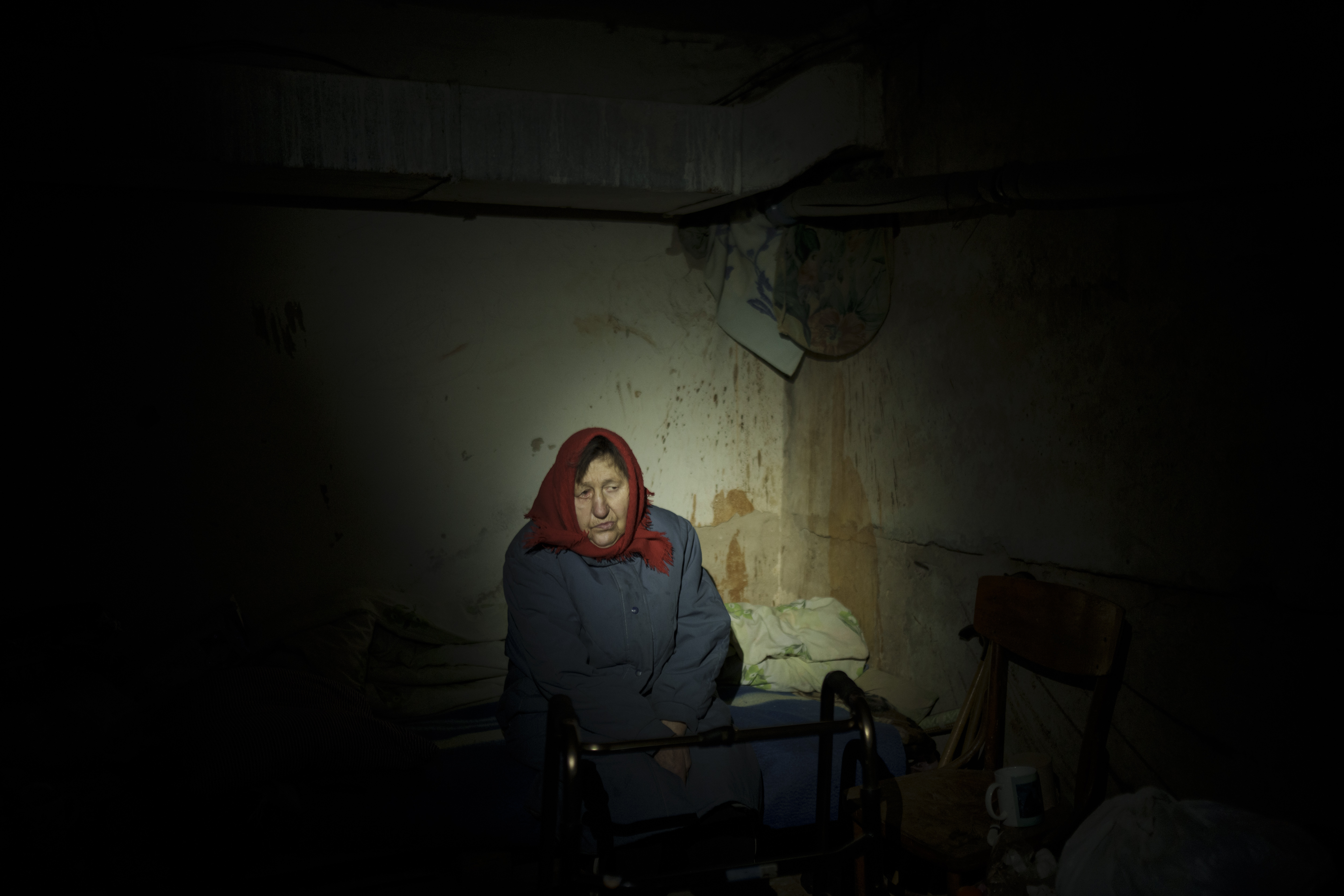 A woman hiding in a basement.
