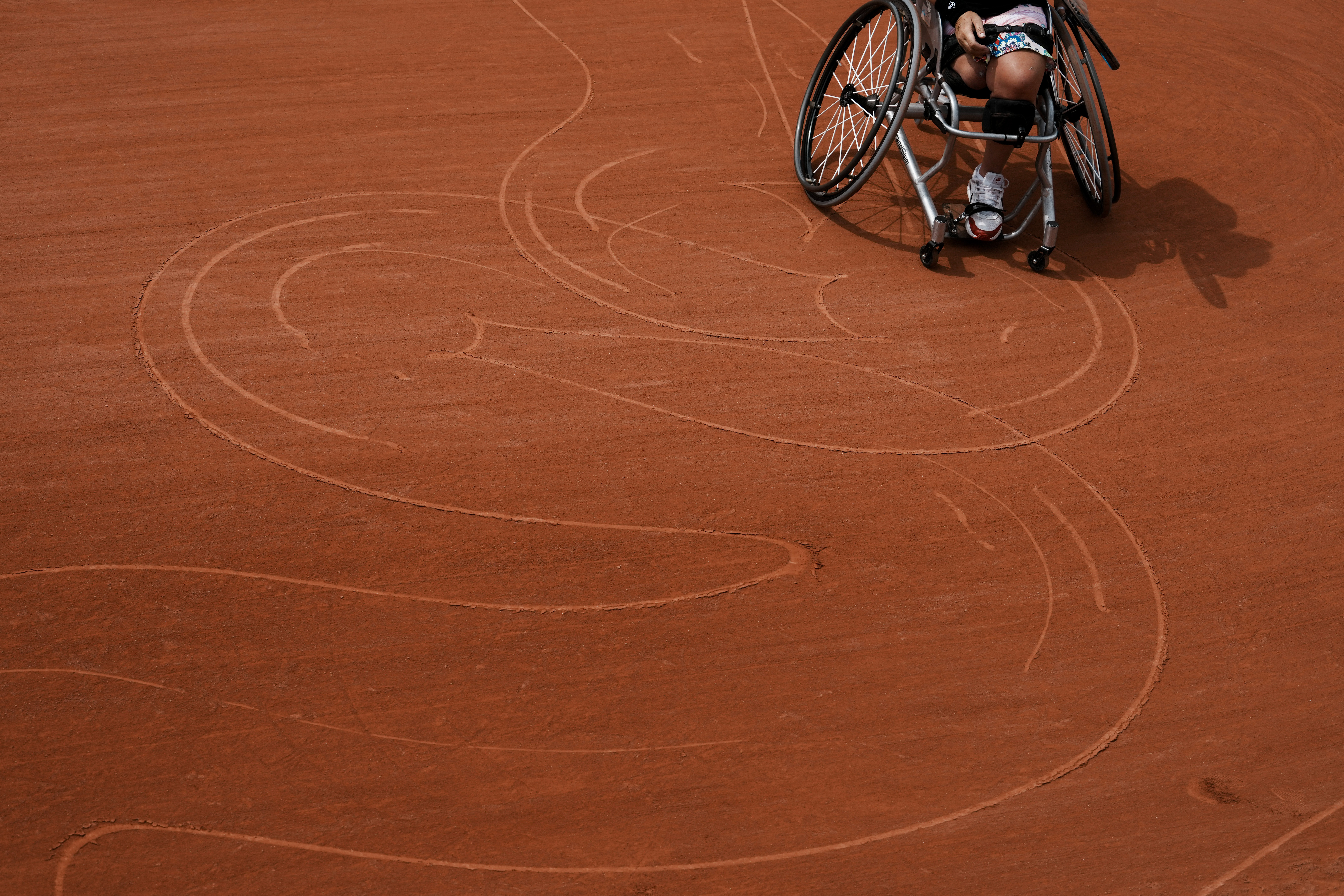 A wheelchair tennis player.