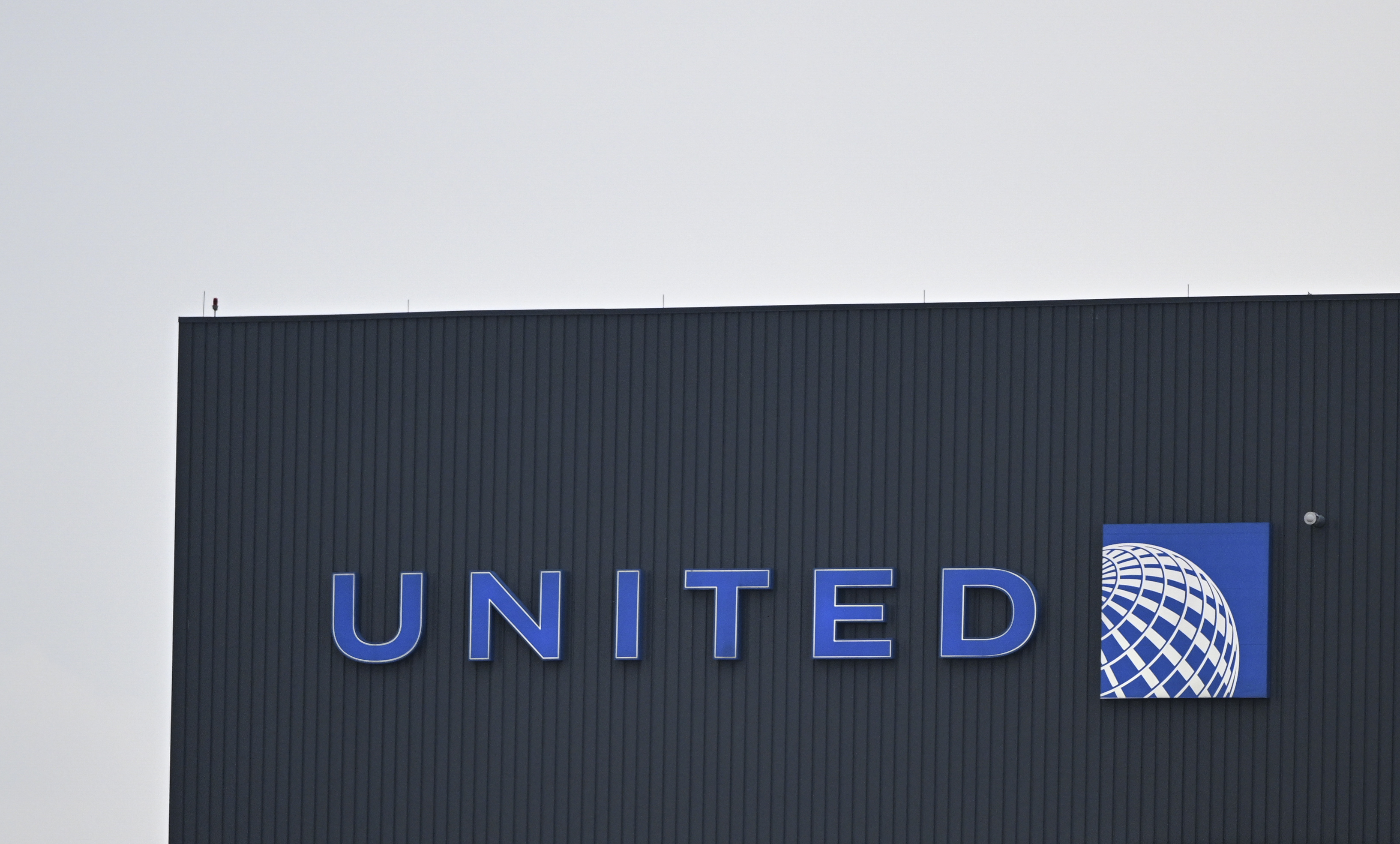A United Airlines building with its logo on it