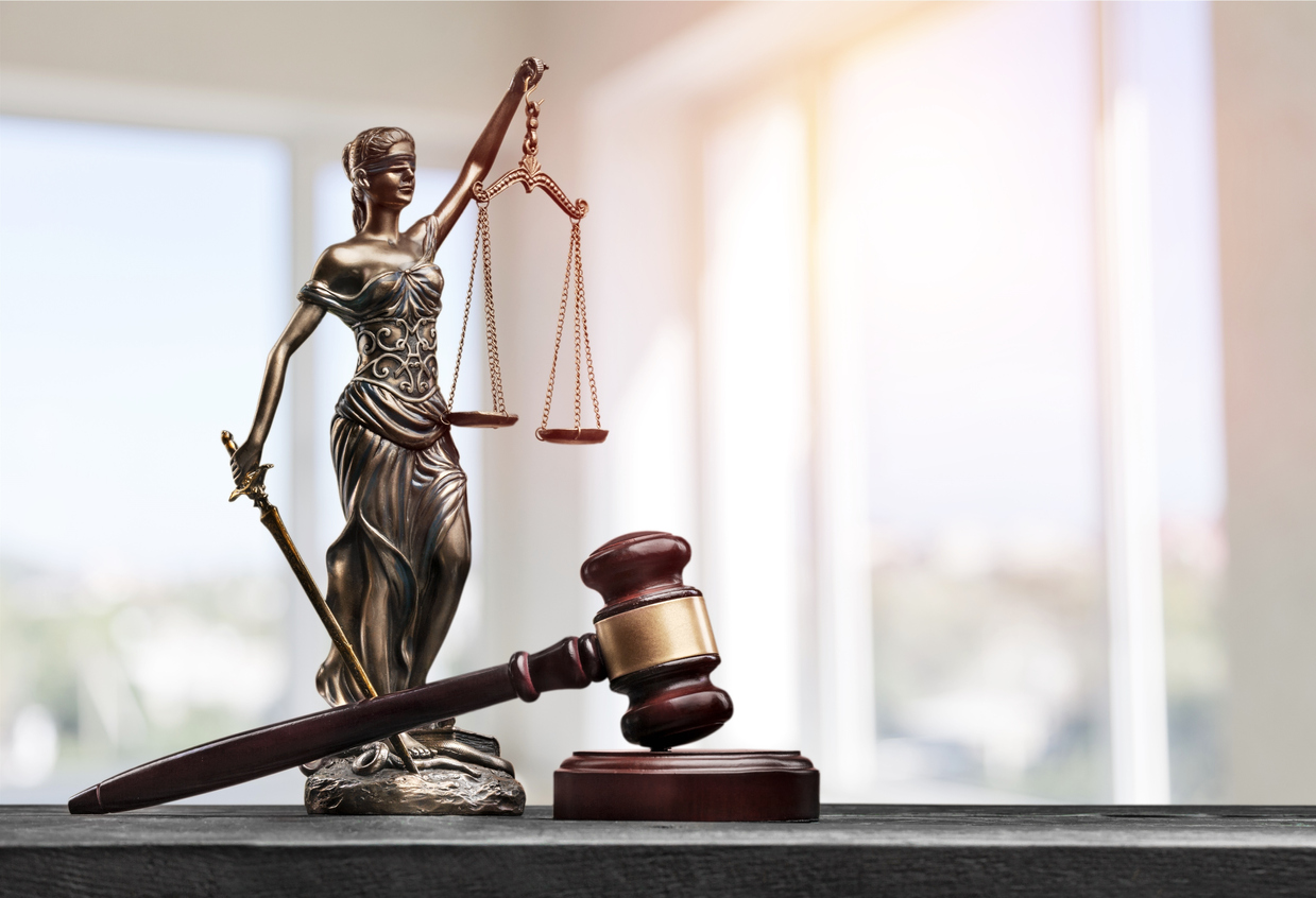 Lady Justice and the scales of justice.