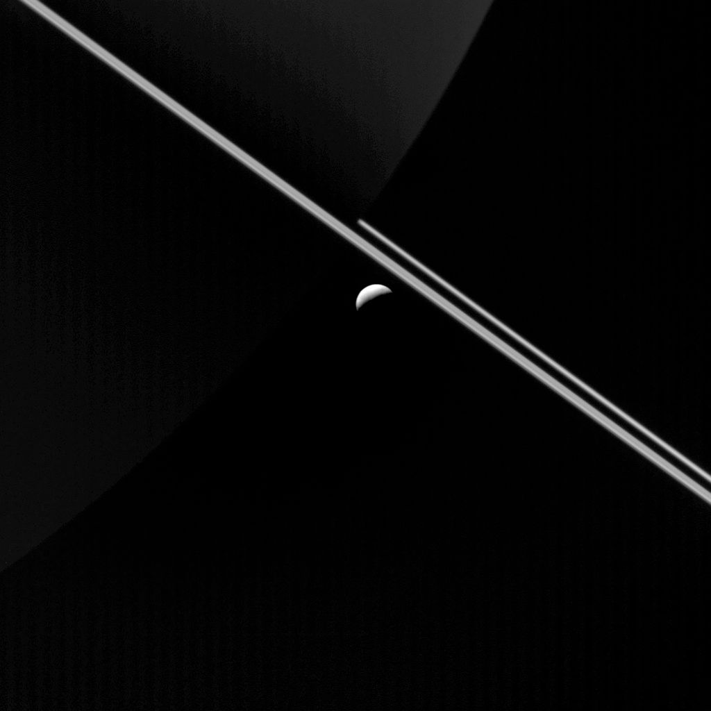 Saturn and Enceladus.