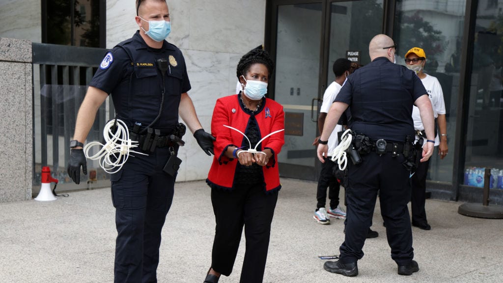 Rep. Sheila Jackson Lee is arrested on Thursday at a voter rights protest.