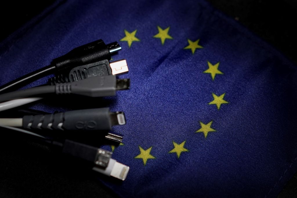 Mobile chargers next to European flag
