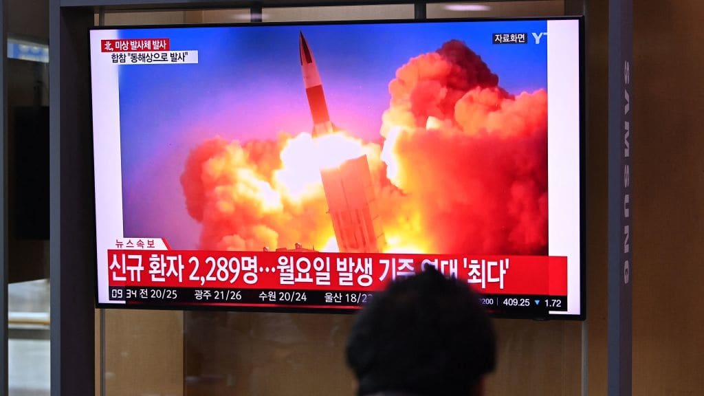 File footage of a North Korean missile launch airs on South Korean TV.