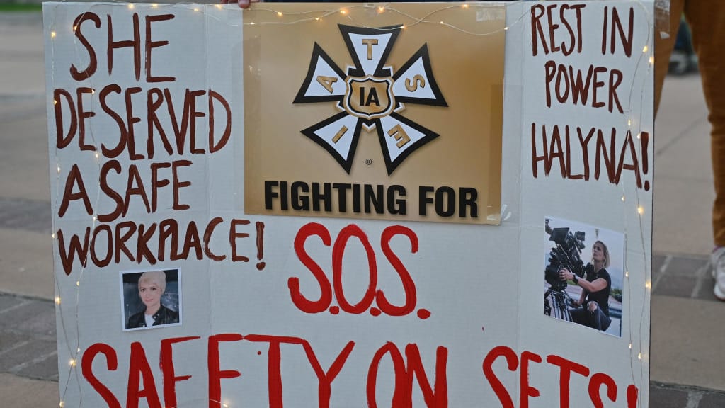 A poster protesting the death of Halyna Hutchins.