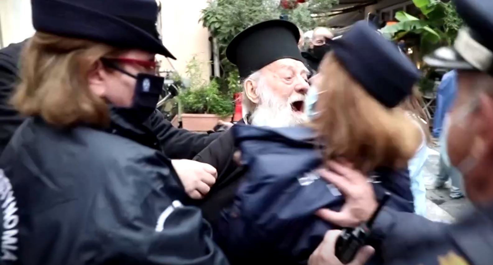 orthodox priest being arrested