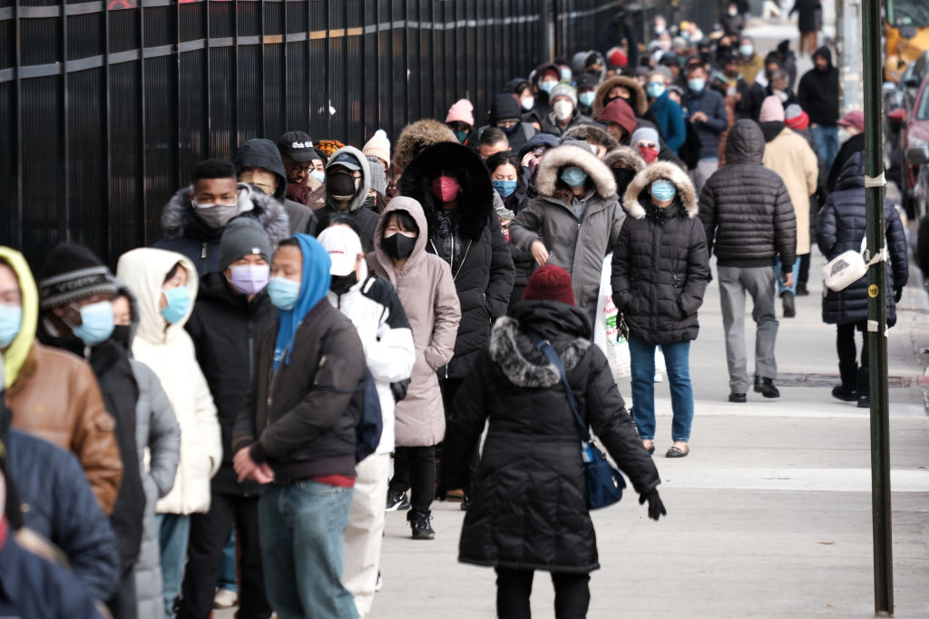 New Yorkers wait in line for COVID-19 tests.