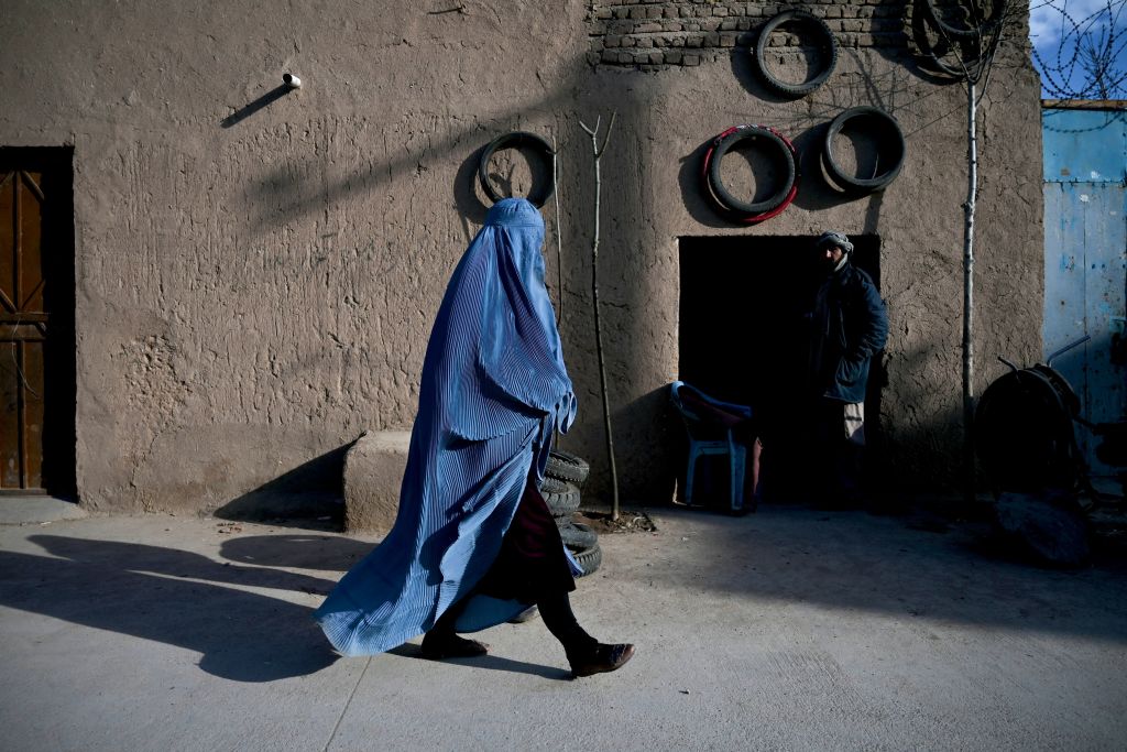 Afghan woman on street.