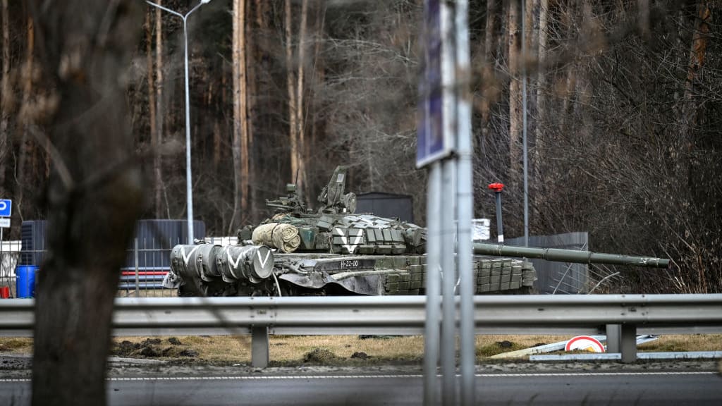 A Russian tank in Irpin, west of Kyiv, on Friday.