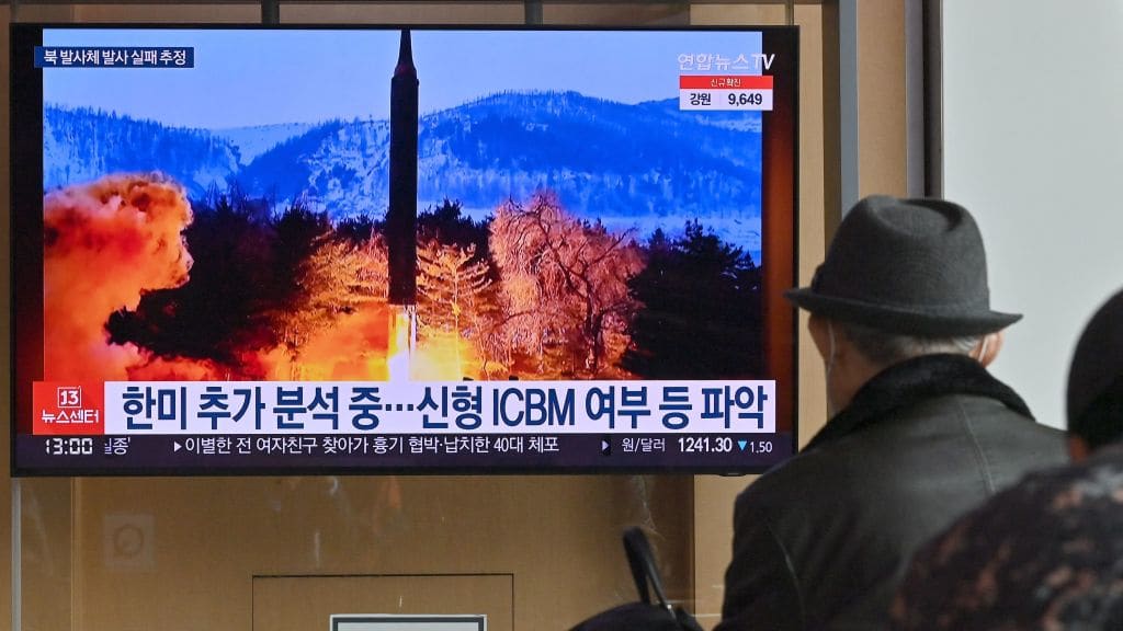 A man watches television coverage of North Korea&#039;s failed missile launch.