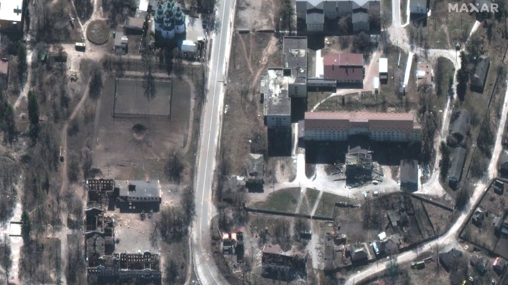 Satellite imagery from March 24 showing damaged buildings in Izium, Ukraine.