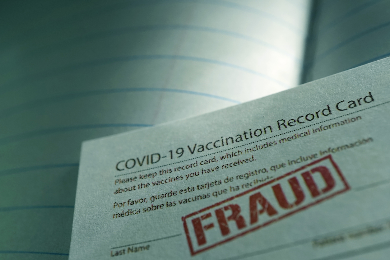 COVID-19 vaccine card stamped with the word &quot;Fraud&quot;