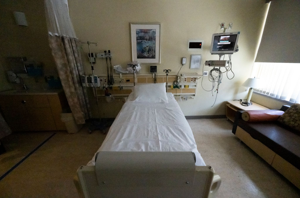Empty hospital bed.