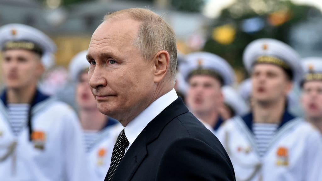 Russian President Vladimir Putin with members of Russia&#039;s navy.