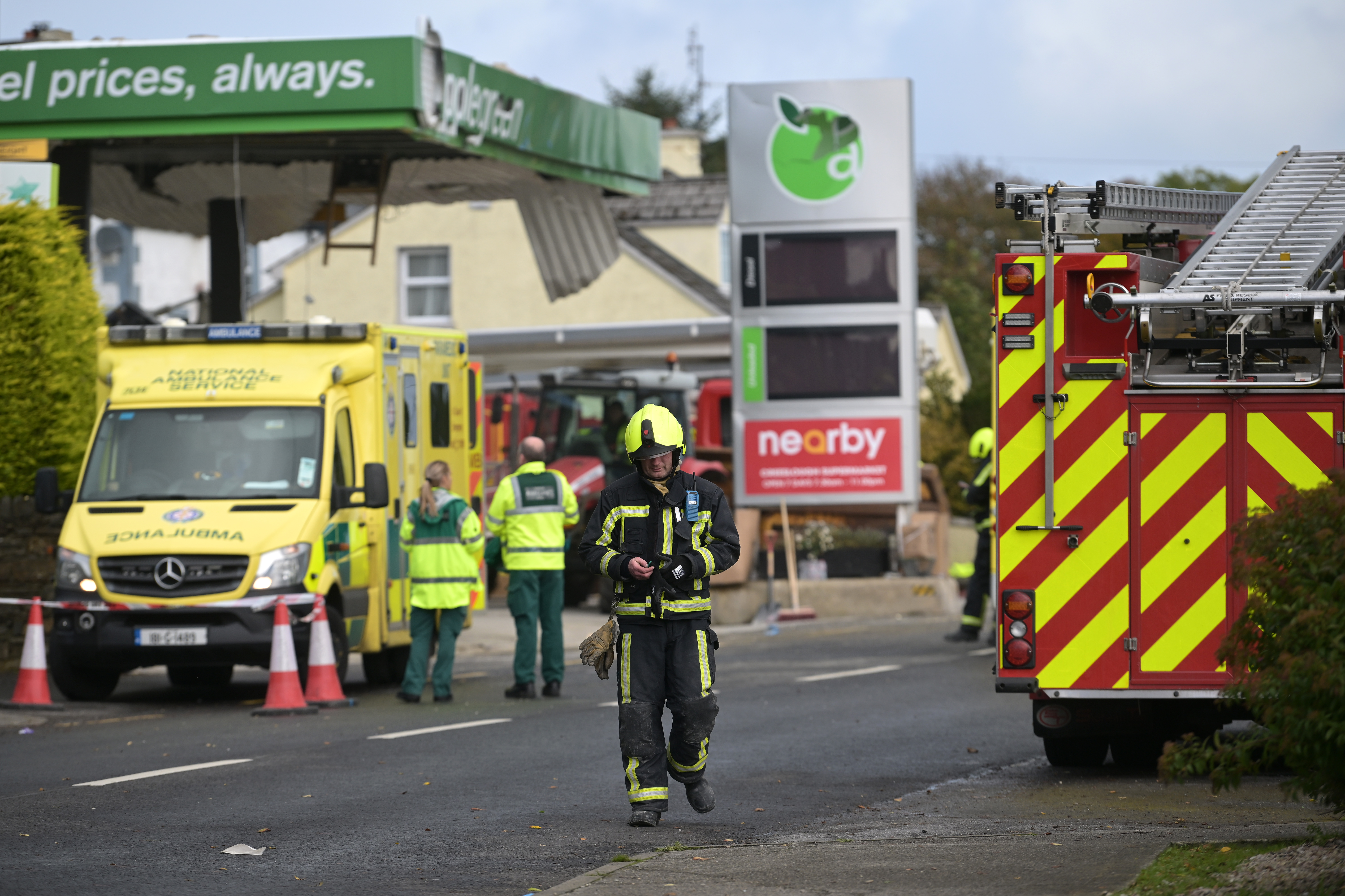 A view of rescue workers at a gas station in Ireland following a deadly explosion.