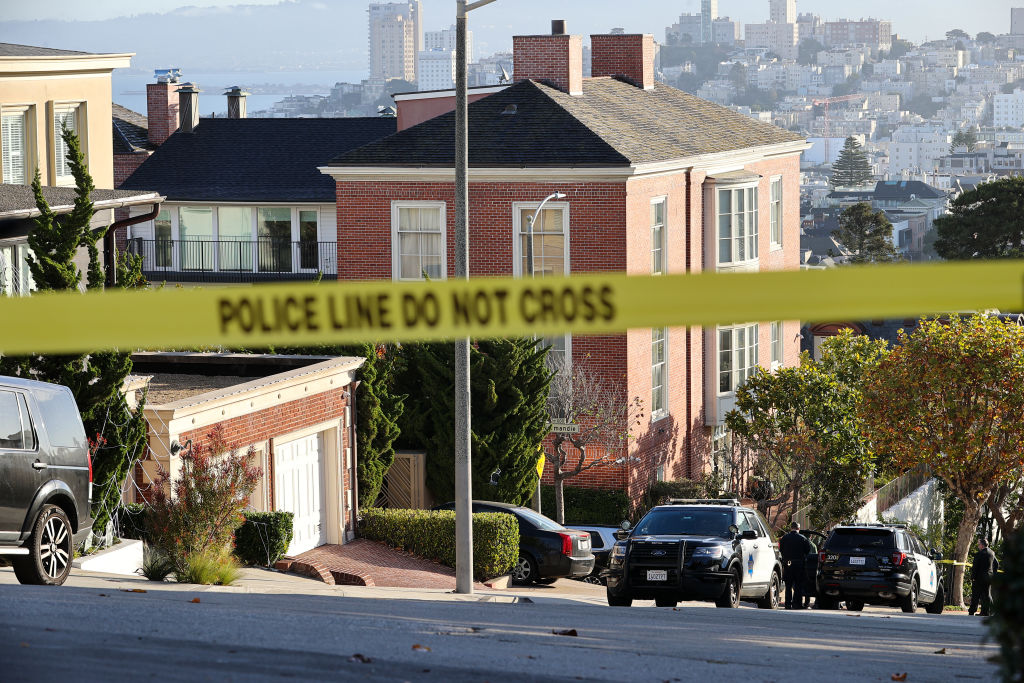 Pelosi residence in San Francisco behind a police line.