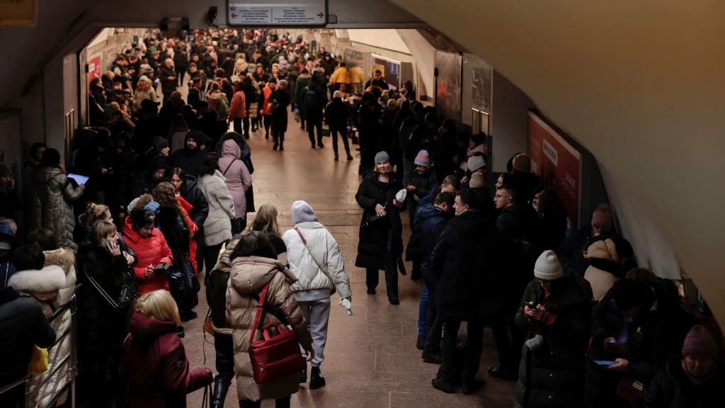 Ukrainians seek shelter in a Kyiv subway station.