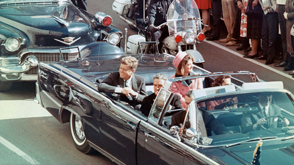 President John F. Kennedy minutes before his assassination.