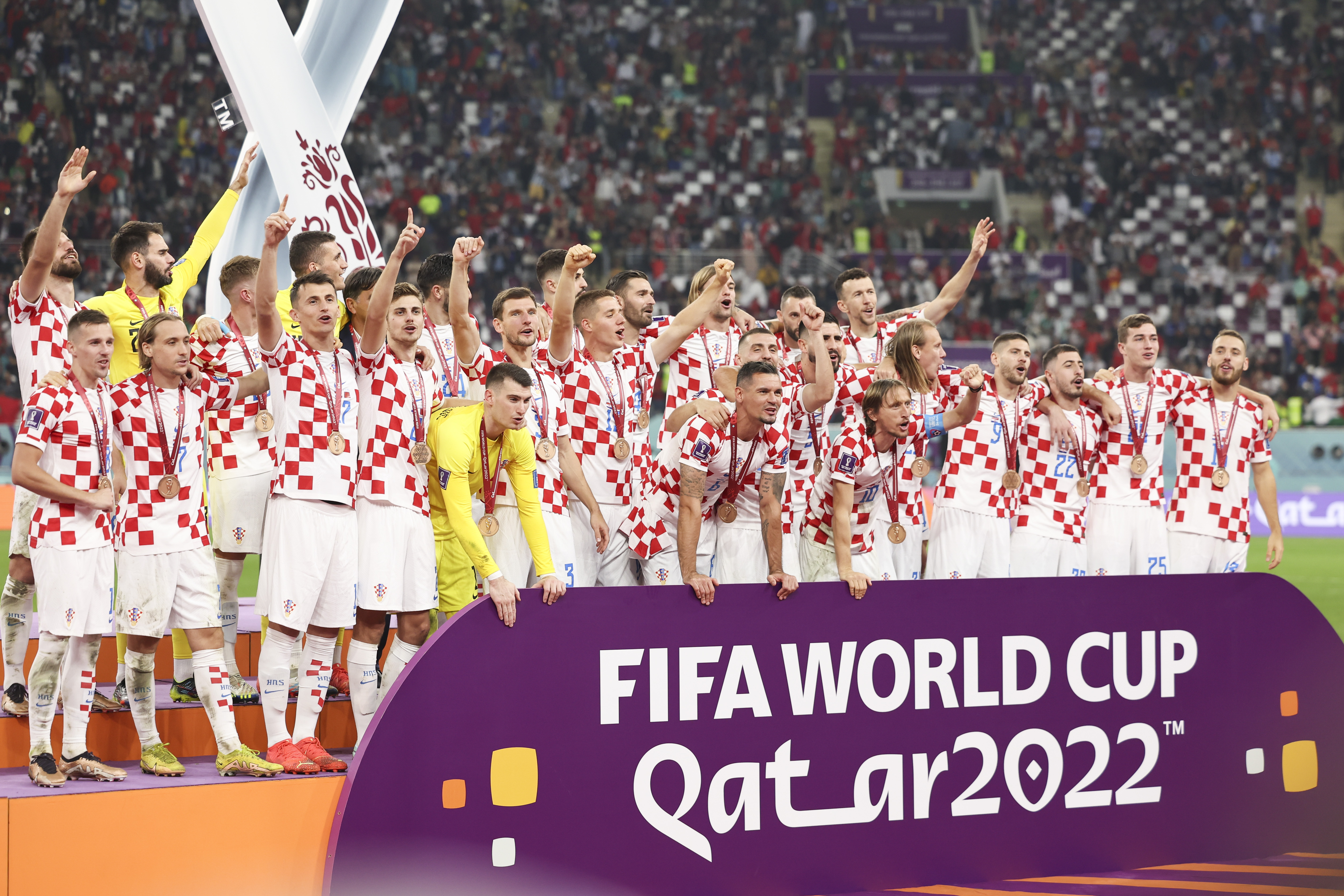 The Croatian national soccer team celebrates third place in the World Cup. 