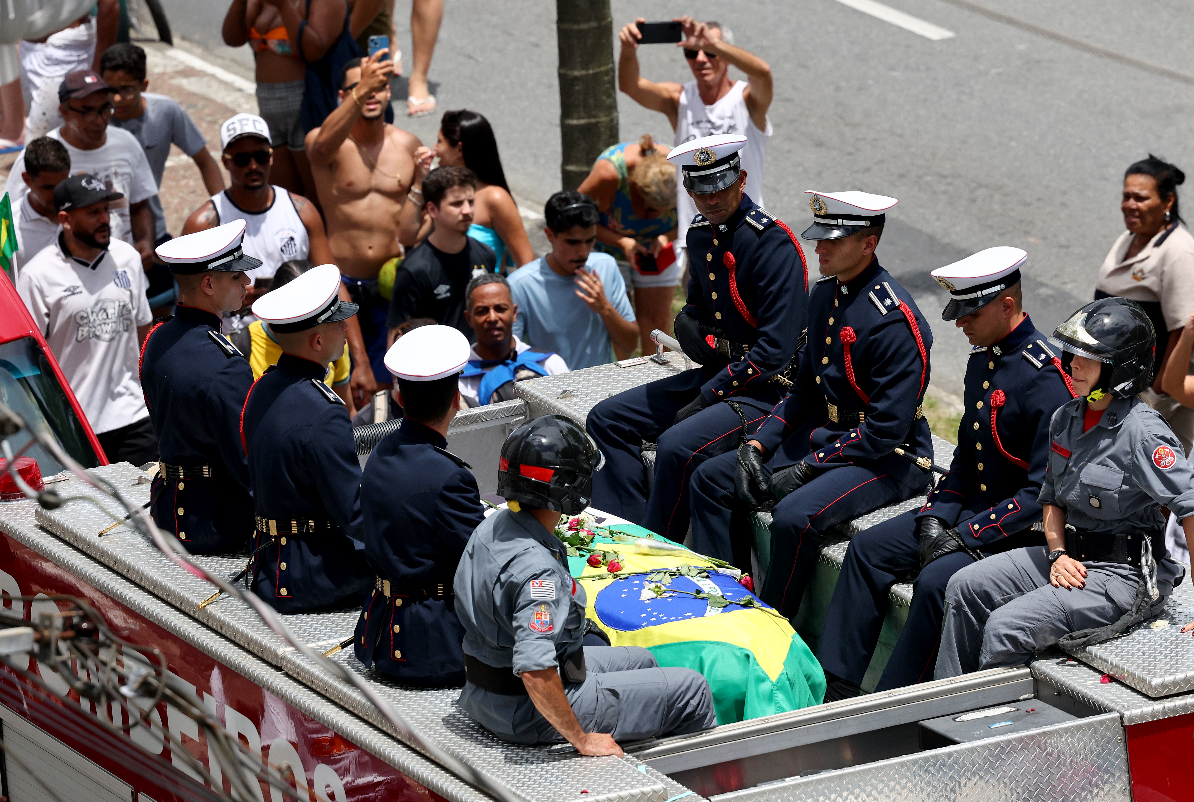 The funeral procession of soccer star Pelé in Brazil. 
