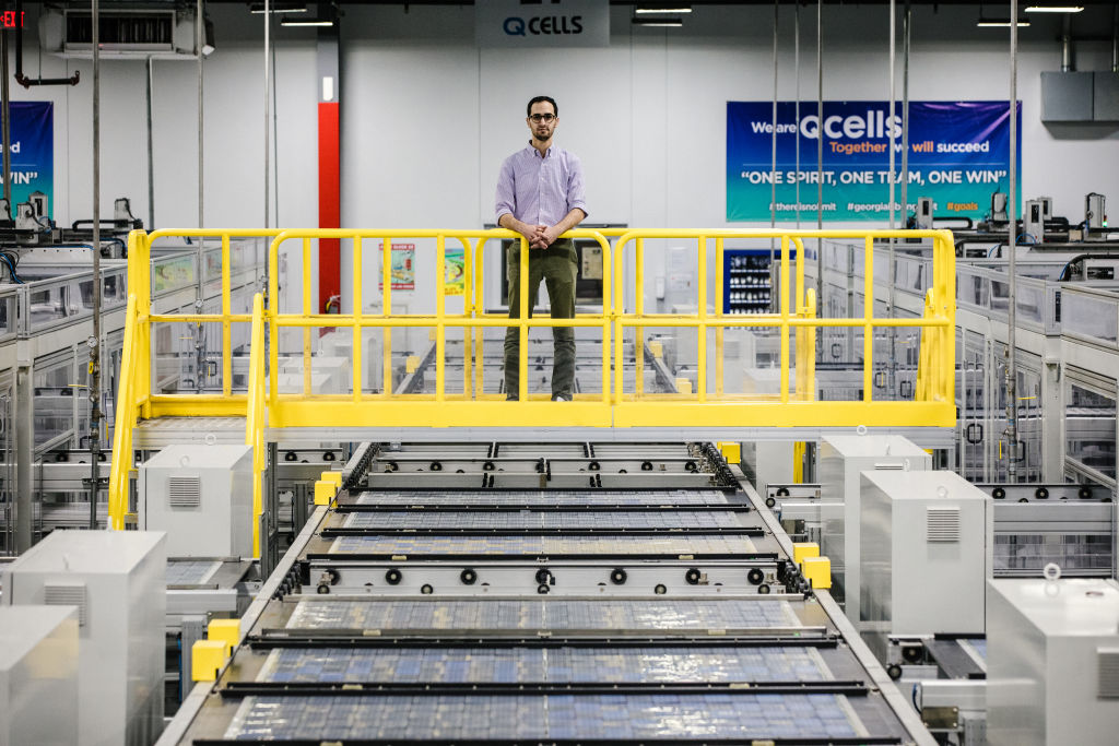 Scott Moskowitz, Head of Market intelligence and Public Affairs at Qcells, stands for a photograph on the assembly floor at the Qcells solar panel manufacturing facility in Dalton, Georgia.
