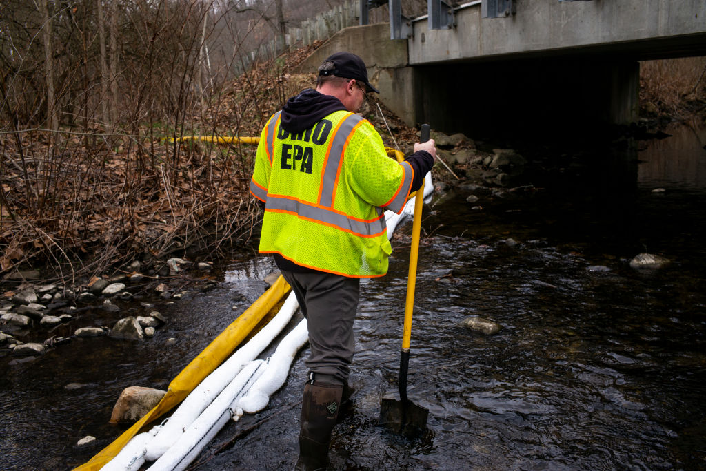 An EPA agent helps clean up in East Palestine, Ohio. 
