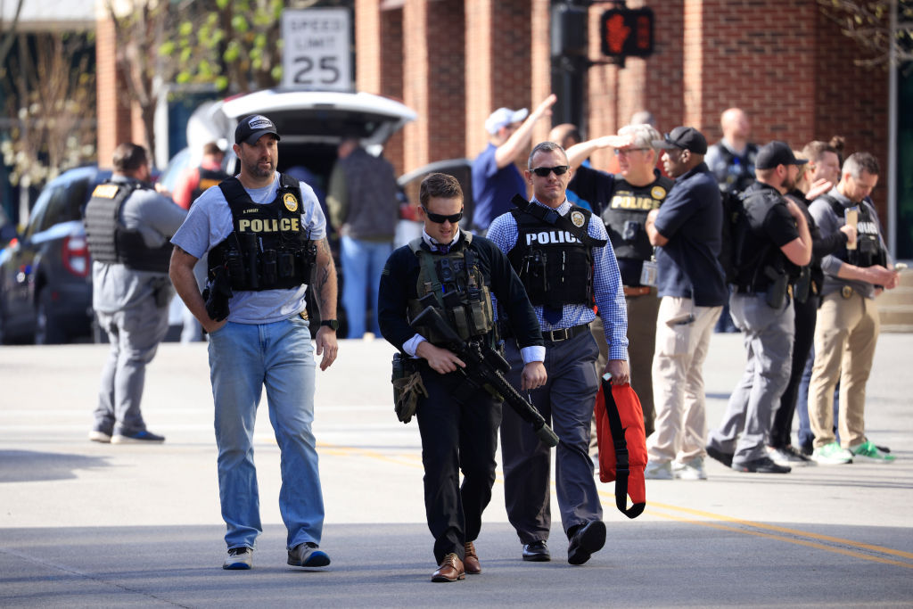 Police at the scene of a mass shooting in Louisville, Kentucky. 