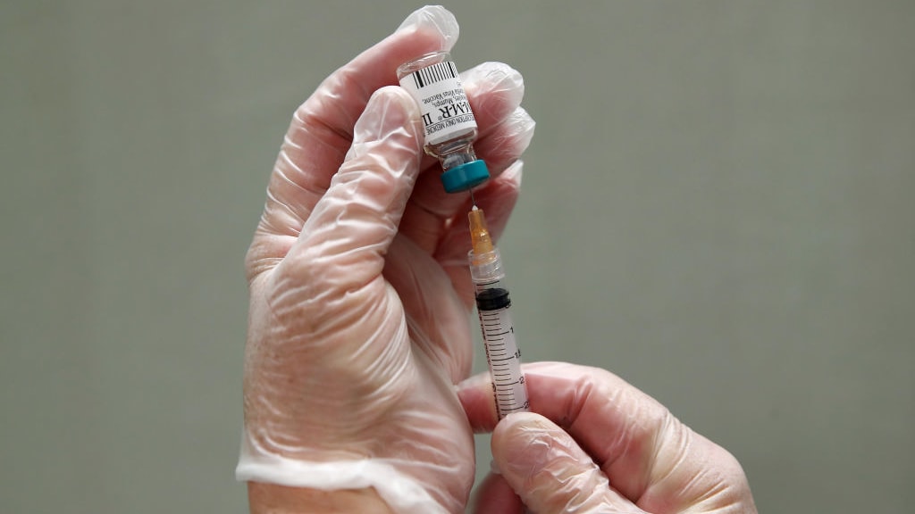 A vaccine being prepared.