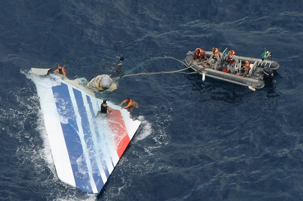 Workers recover a piece of debris from Air France Flight 447 in 2009. 