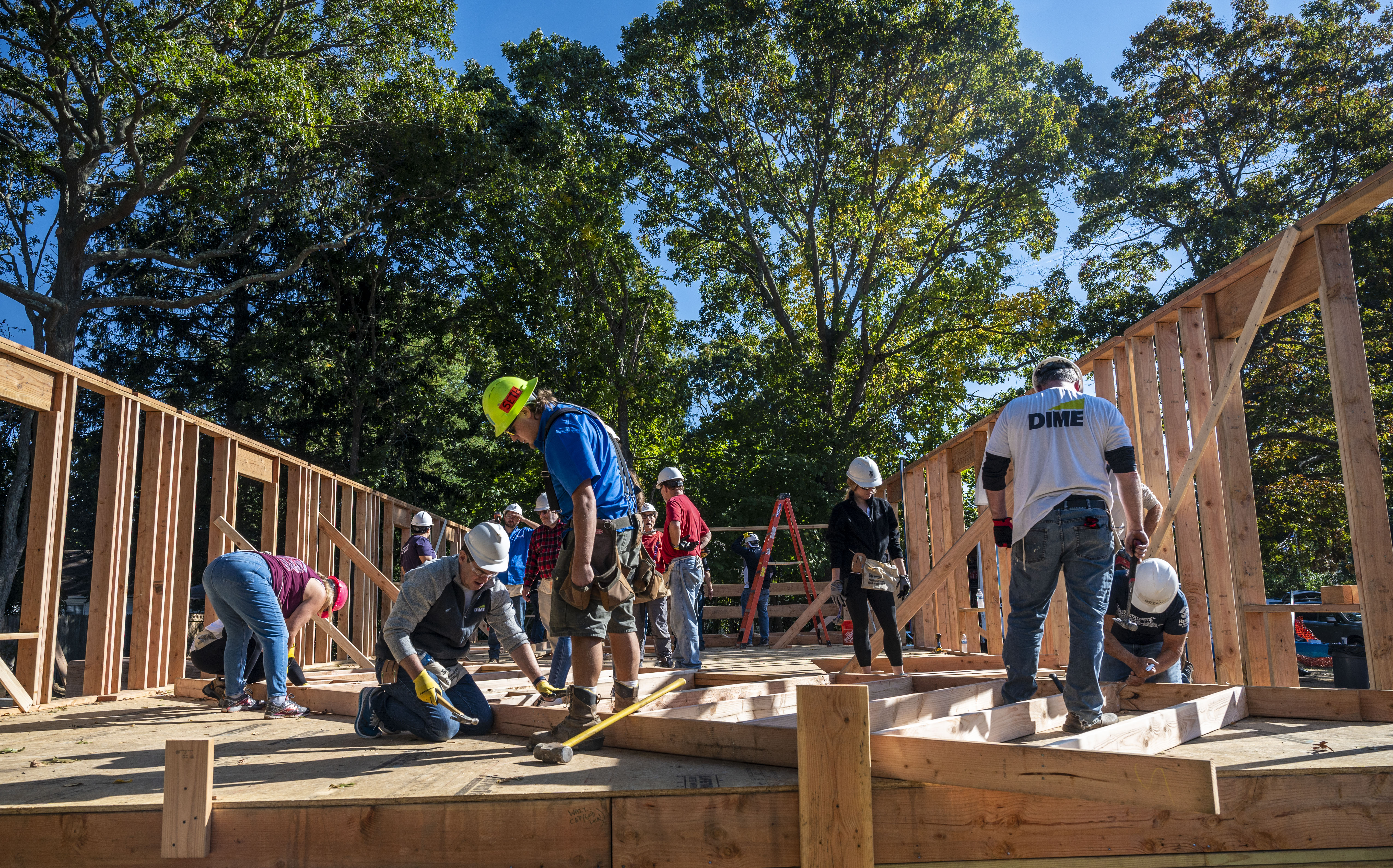  Members of Habitat for Humanity build a home