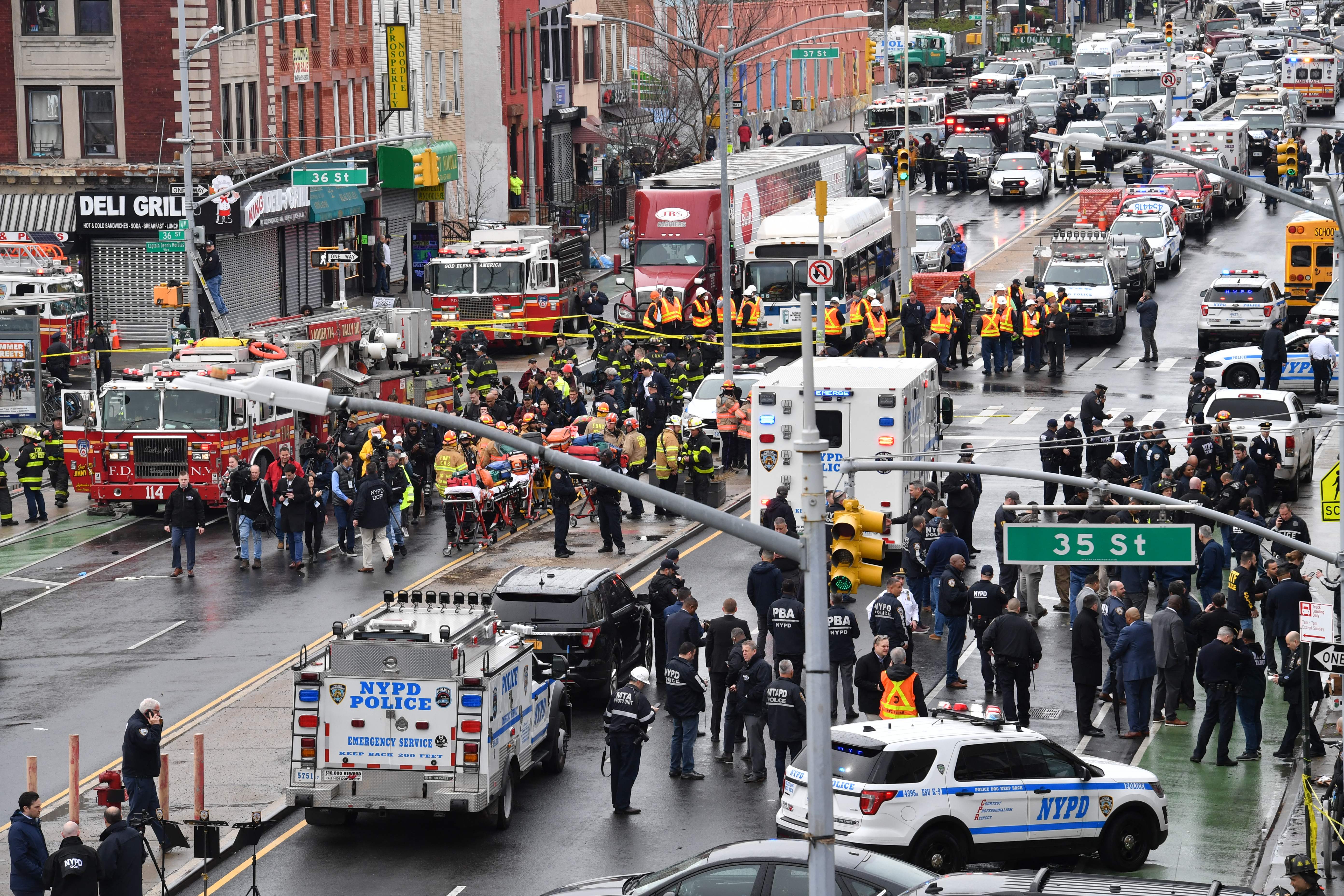 Emergency responders at the site of the Brooklyn subway shooting