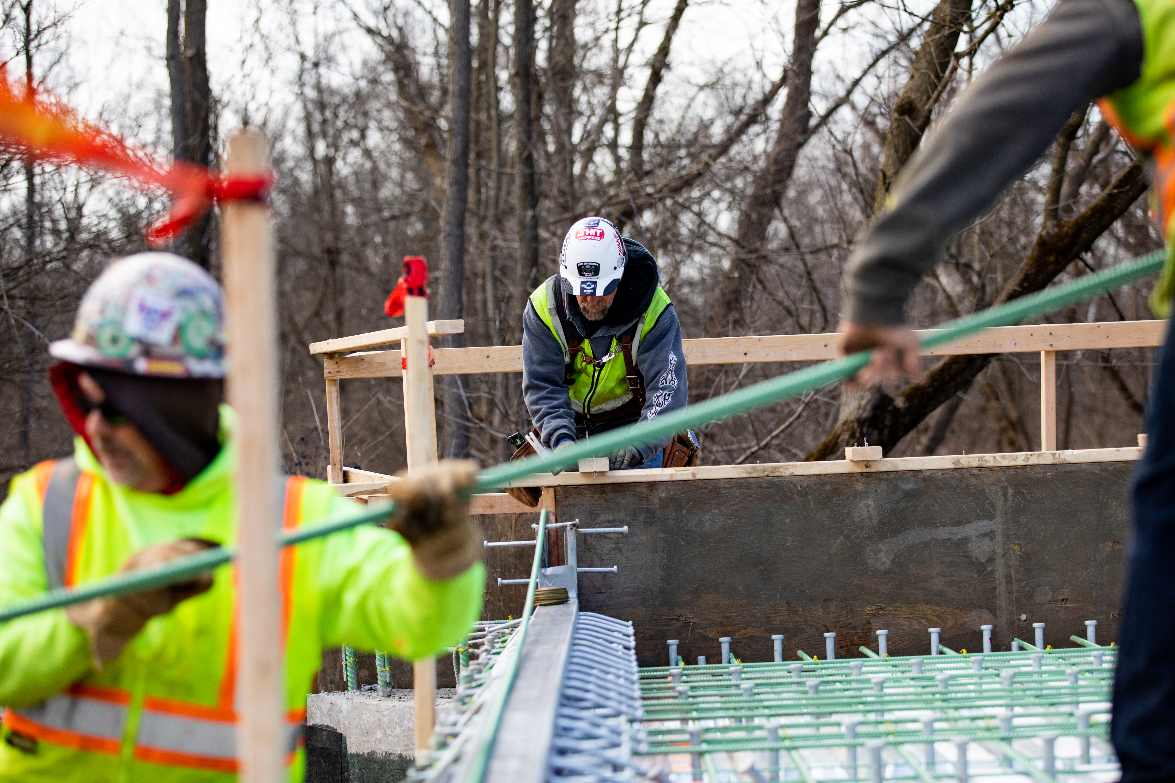 Contractors work on a bridge in Armada, Michigan
