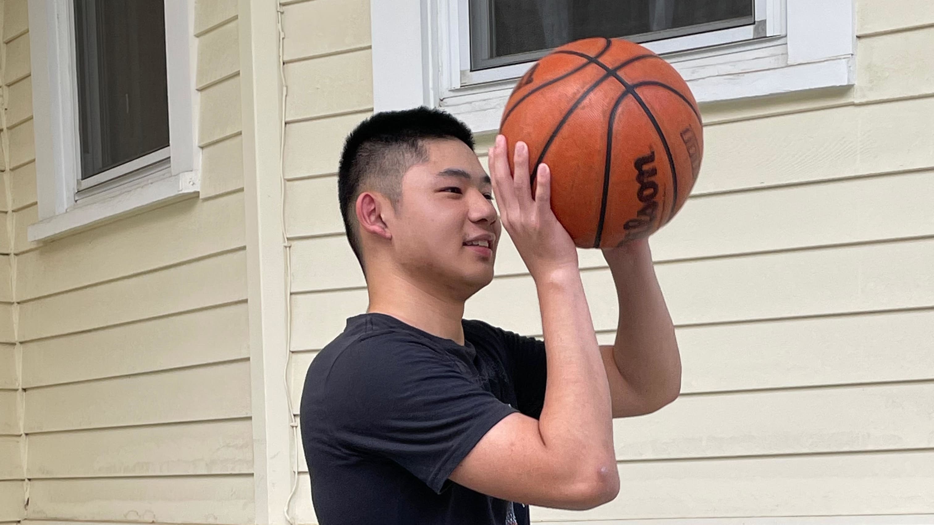 Brandon Shintani playing basketball.