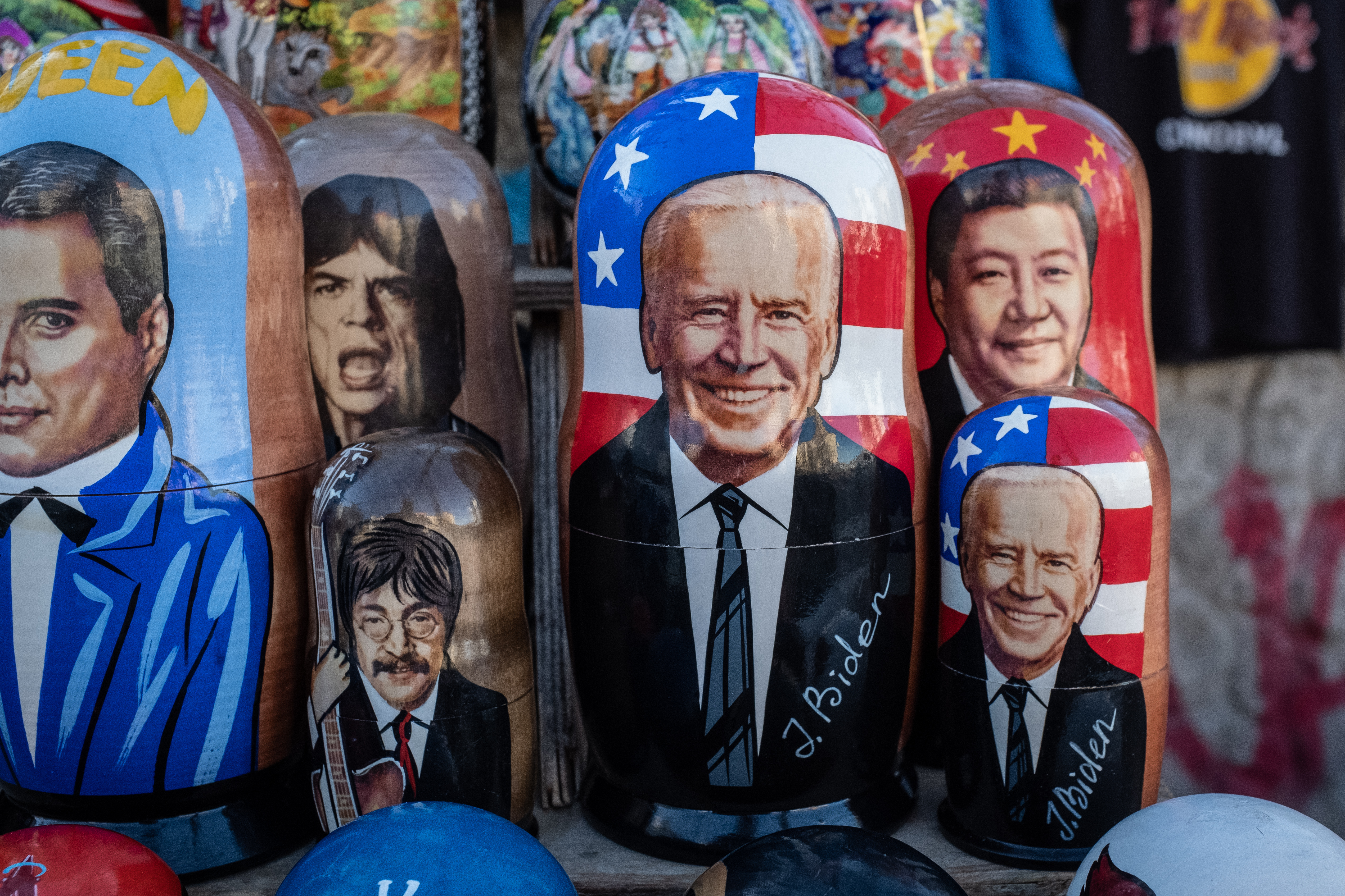Joe Biden and Chinese leader Xi Jinping shown on souvenirs for sale in Kyiv