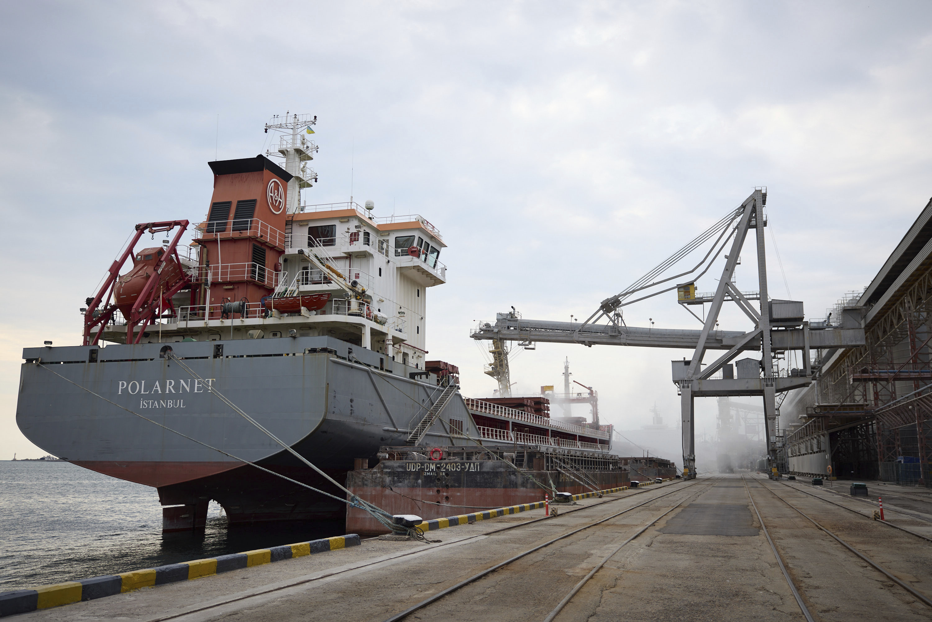 A Turkish cargo ship is loaded with grain in Odesa, Ukraine 
