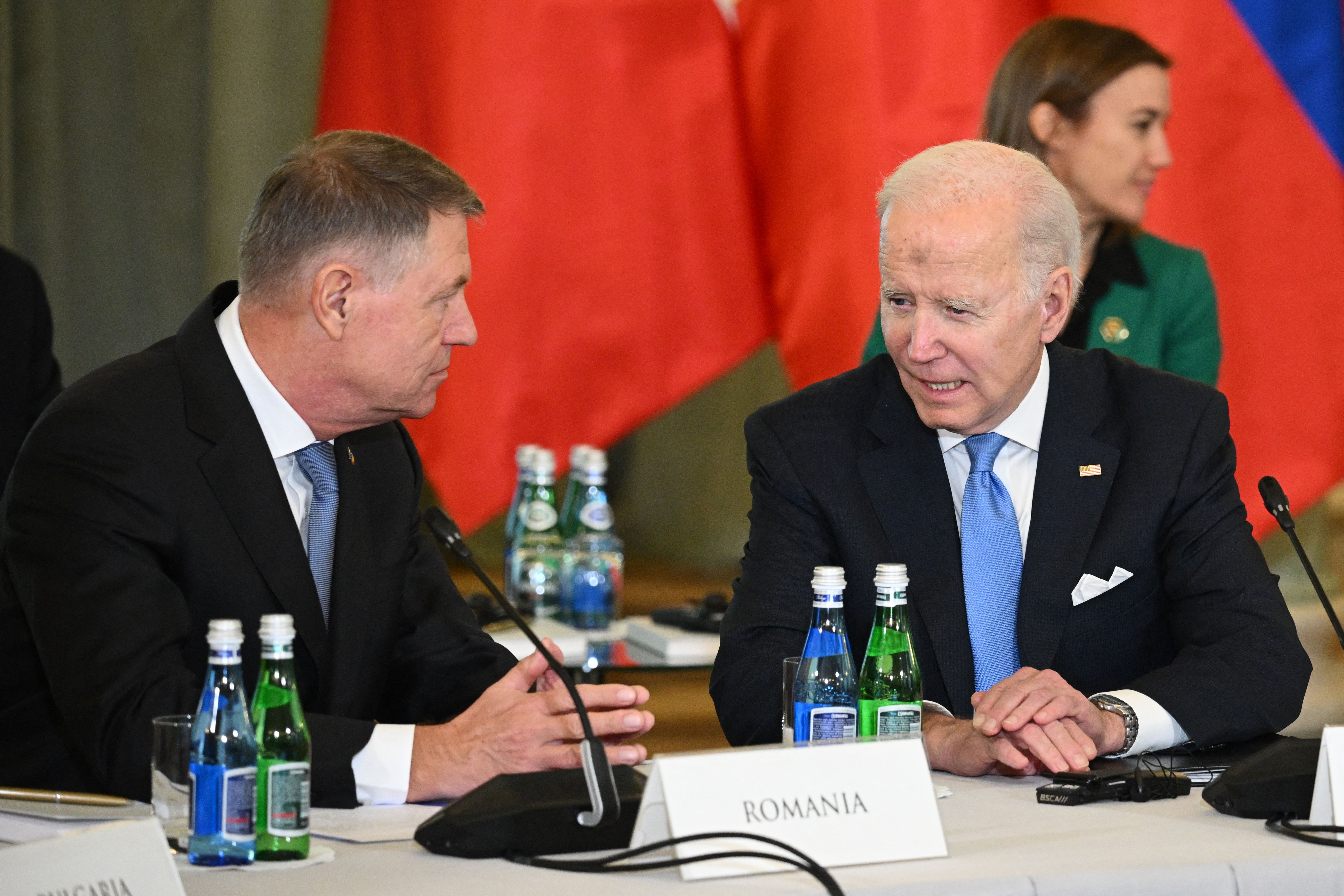 Biden speaking with Romanian President Klaus Iohannis