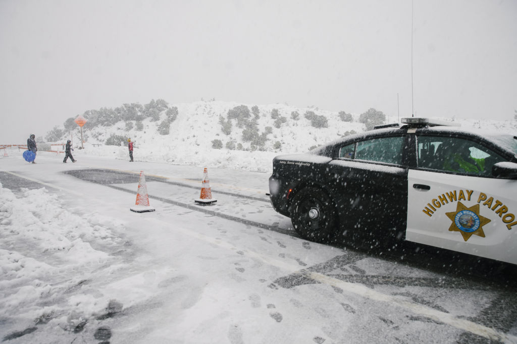 California Highway Patrol blocks the road following a storm. 