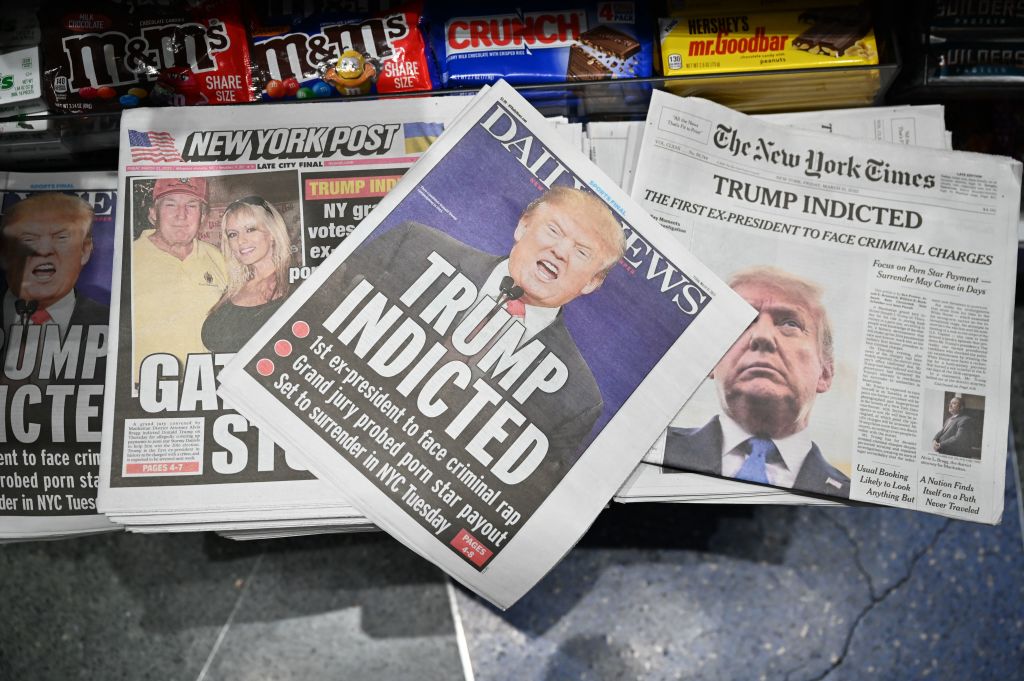 Newspapers depicting the Trump indictment. 