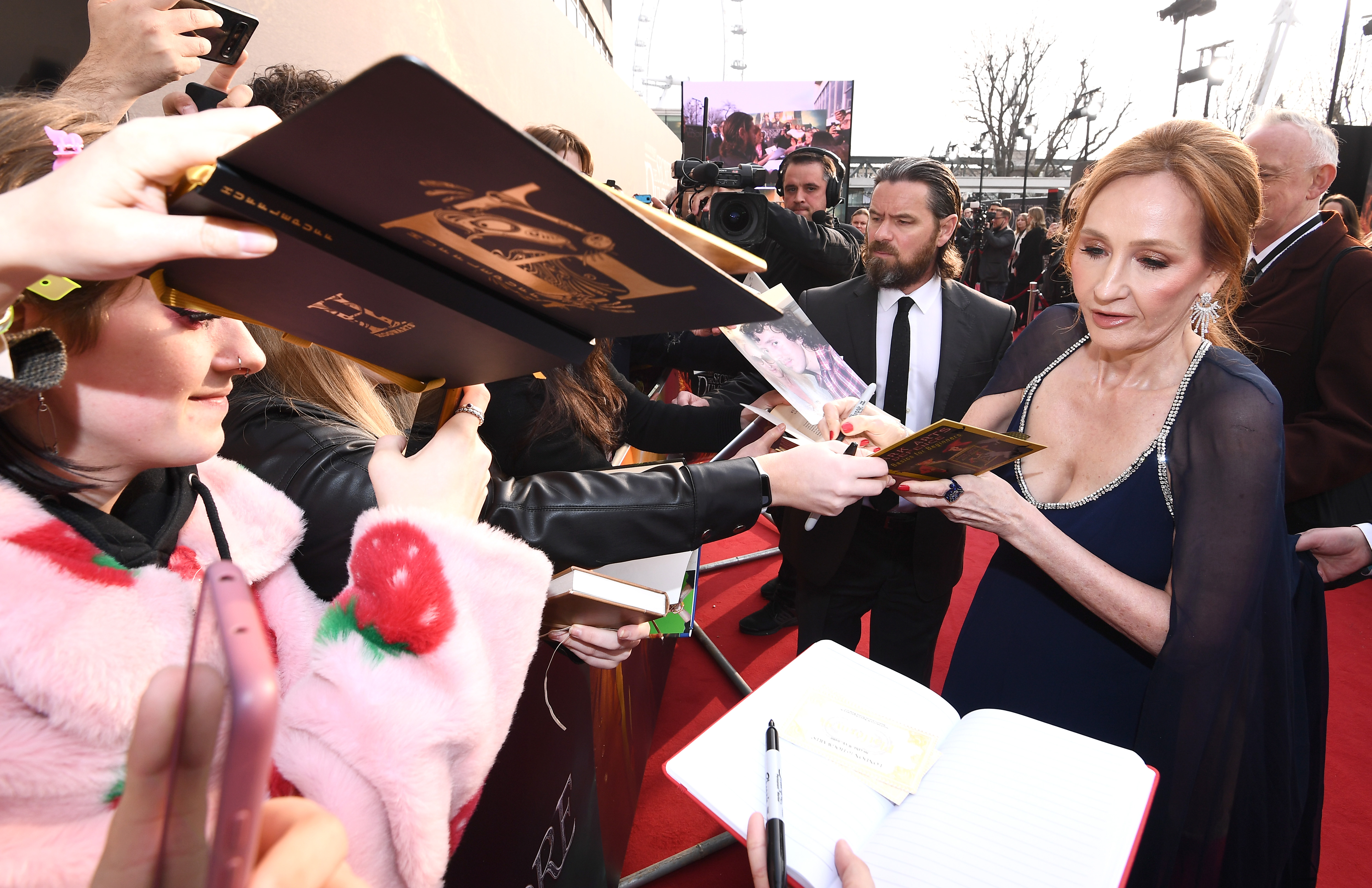 JK Rowling signs autographs