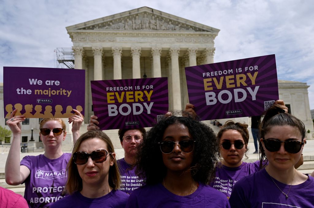 Abortion rights activists protest outside the Supreme Court. 